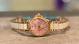 Faioki ladies mechaical watch with butterfly features on the pinkish nacre dial