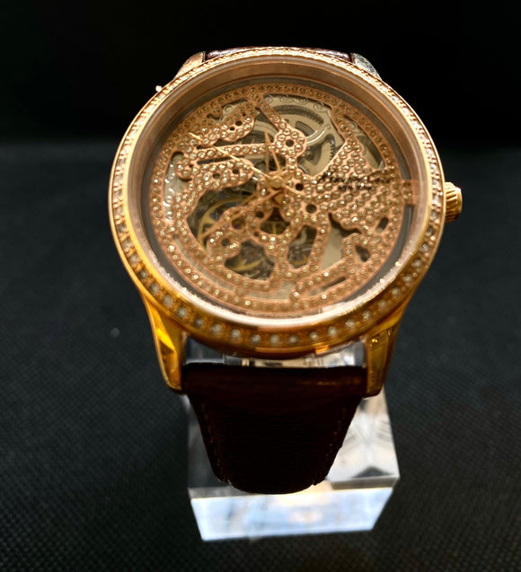 Beautiful Skeleton mechanical watch for ladies with studded bezel in a Rose Gold case. Automatic.