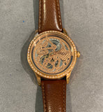 Ladies dress watch with beautiful and striking bronze skeleton dial and diamantes bezel
